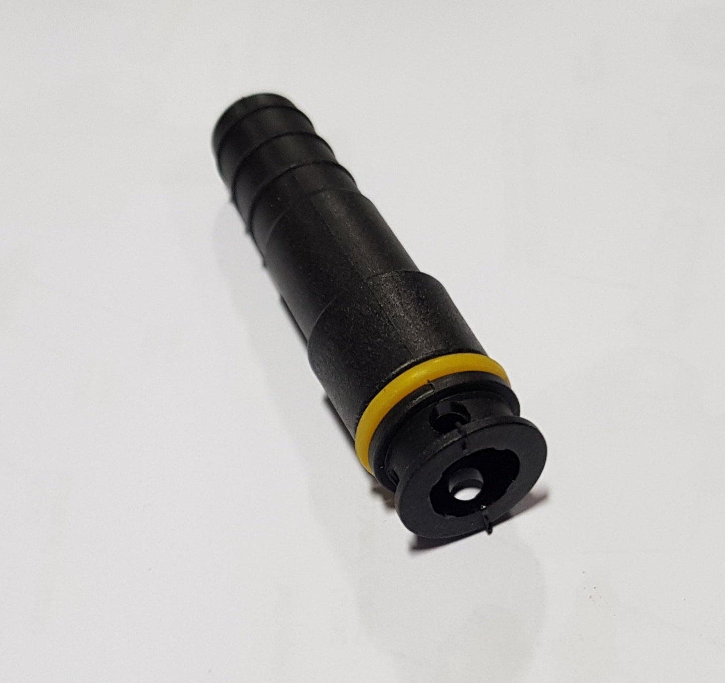 A black hose adapter with a yellow ring, labeled as an E-Feed V2 injector hose adaptor.