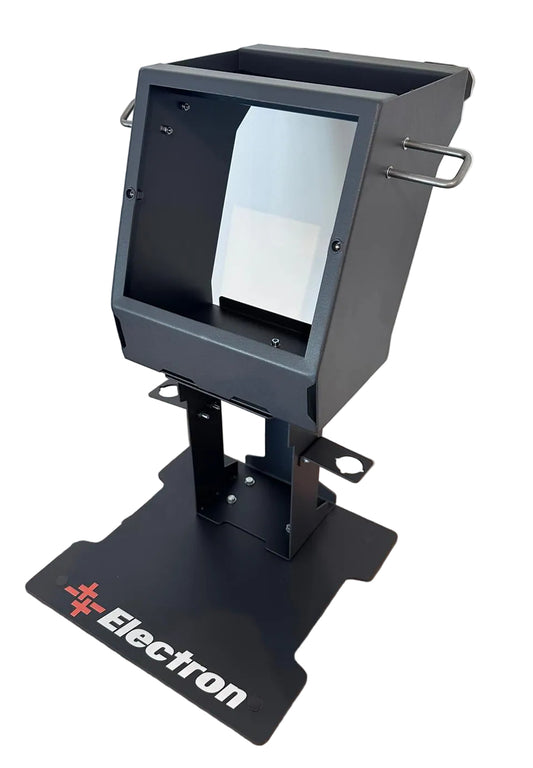 Black electronic device on a cardboard box with 'Electron' branding.